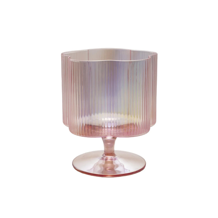 Hand-blown 12 oz. wine glass with pink pleated goblet, wide bowl, flower-shaped stem, and iridescent finish.