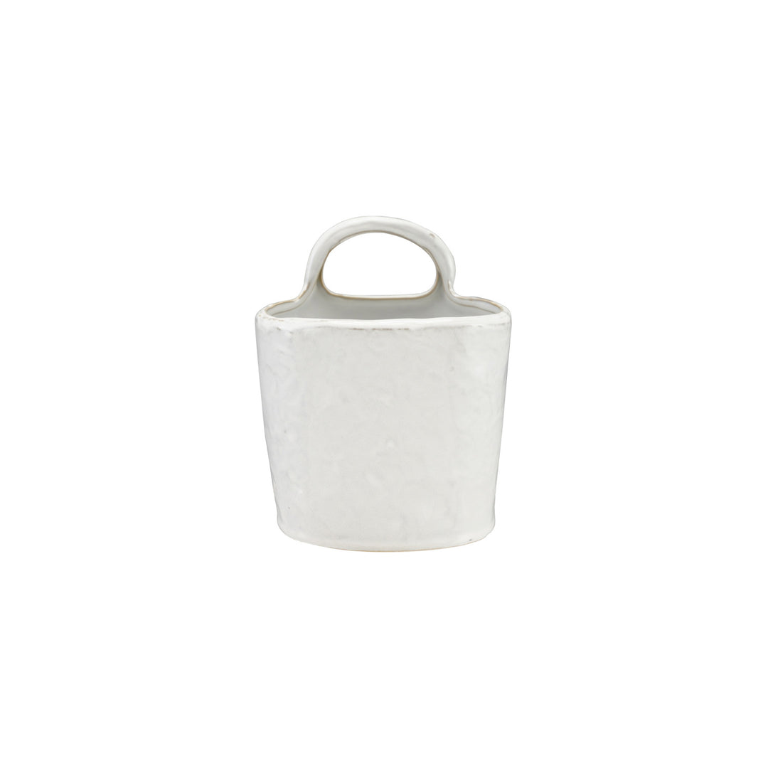 White stoneware crock with textured ceramic finish and loop handle; sizes vary. Each piece unique.