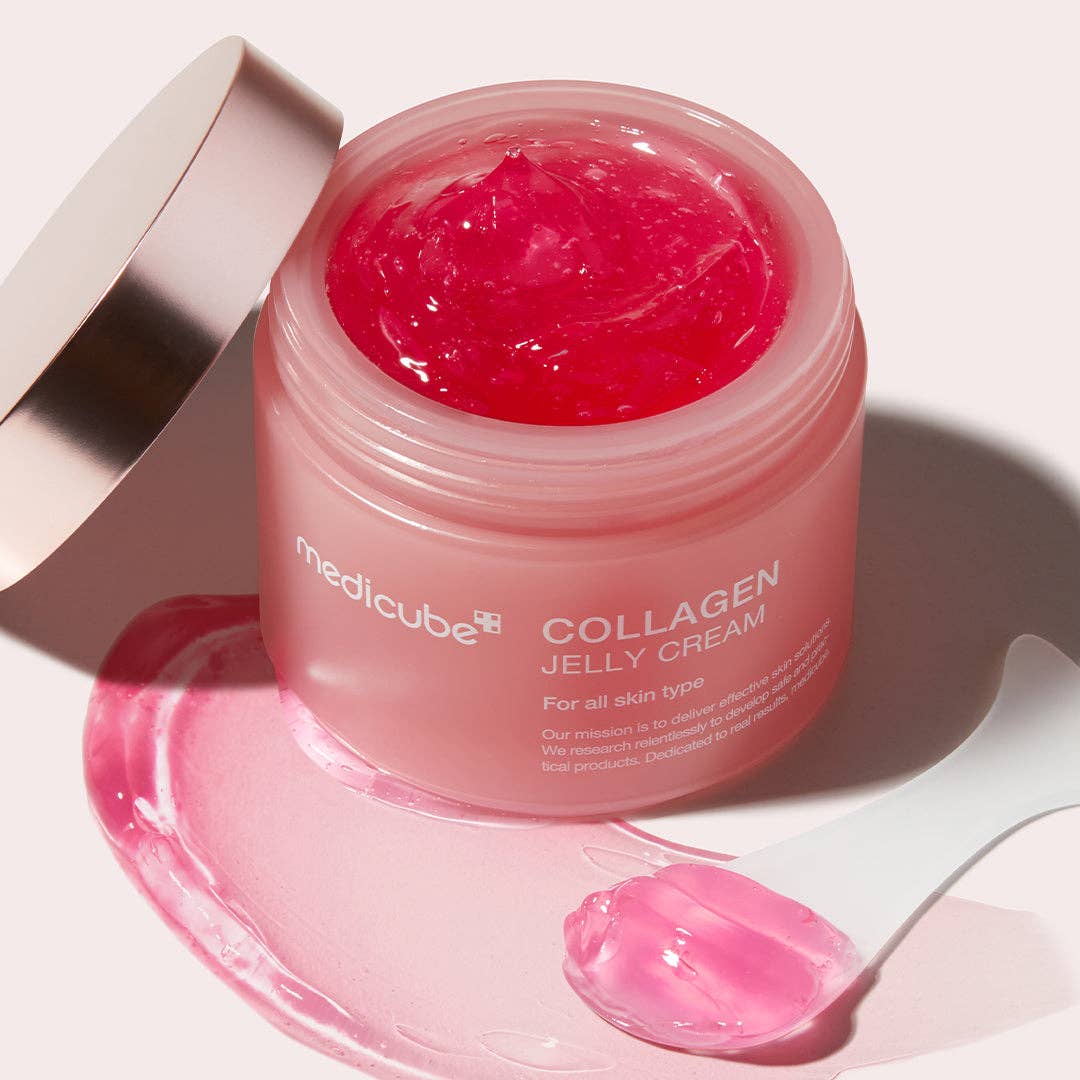 MEDICUBE Collagen Niacinamide Jelly Cream jar open, pink gel shown with spatula. Available in 50ml and 100ml sizes.