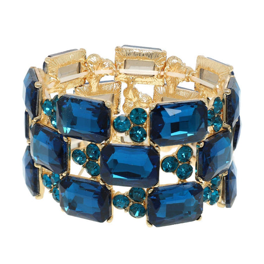 3-row bracelet with large rectangular blue crystals and small round blue stones, available in S/M and M/L sizes.