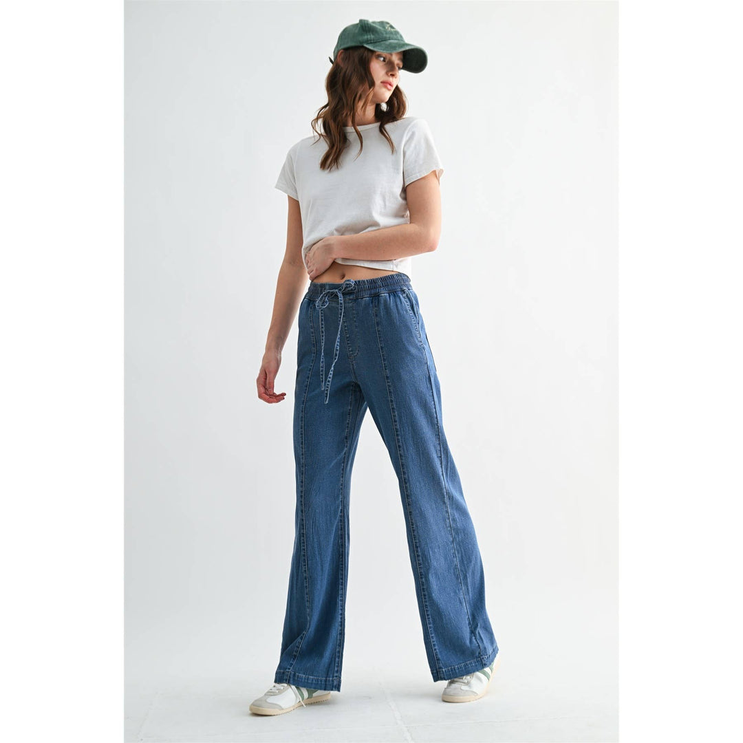 Navy high-rise wide joggers with a drawstring waist and center-seam detailing. Size M.
