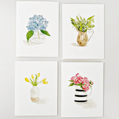 Set of 8 notecards with watercolor flower designs; blank inside. Sizes available: standard notecard size.