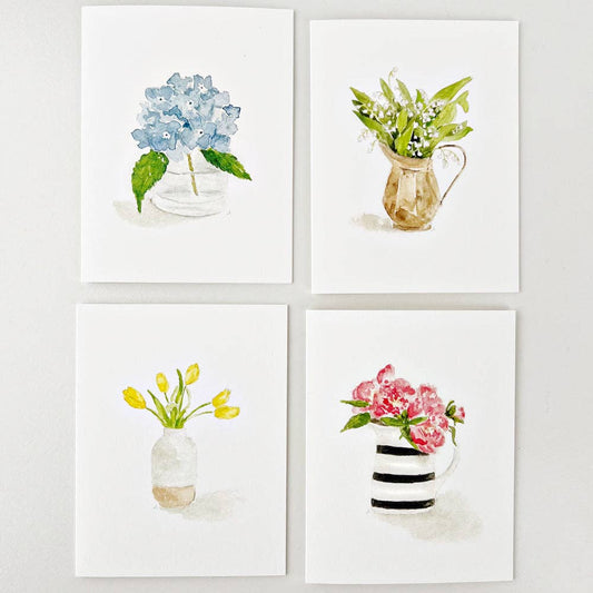 Set of 8 notecards with watercolor flower designs; blank inside. Sizes available: standard notecard size.