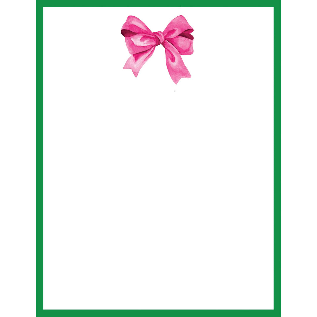 4.25 x 5.5 Pink Bow Notepad with blank white pages, green border, and pink bow at top.