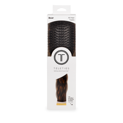 Rectangular white box with clear window displays Boar Bristle Hair Brush | Tortoise. Available in standard and large sizes.