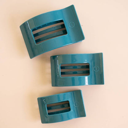 Three Teal With It Large Flat Rectangle Hair Clips, available in varying sizes, each feature two horizontal slits in the center.