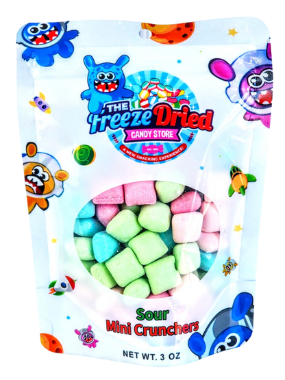 Resealable 3 OZ pouch of Sour Mini Crunchers, pastel candies visible, playful characters on bright packaging.
