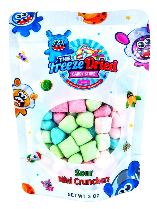 Resealable 3 OZ pouch of Sour Mini Crunchers, pastel candies visible, playful characters on bright packaging.