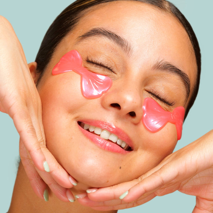 Pretty in Pink! Brightening Undereye Masks—pink, heart-shaped, rosewater-infused. Available in a pack of 8.