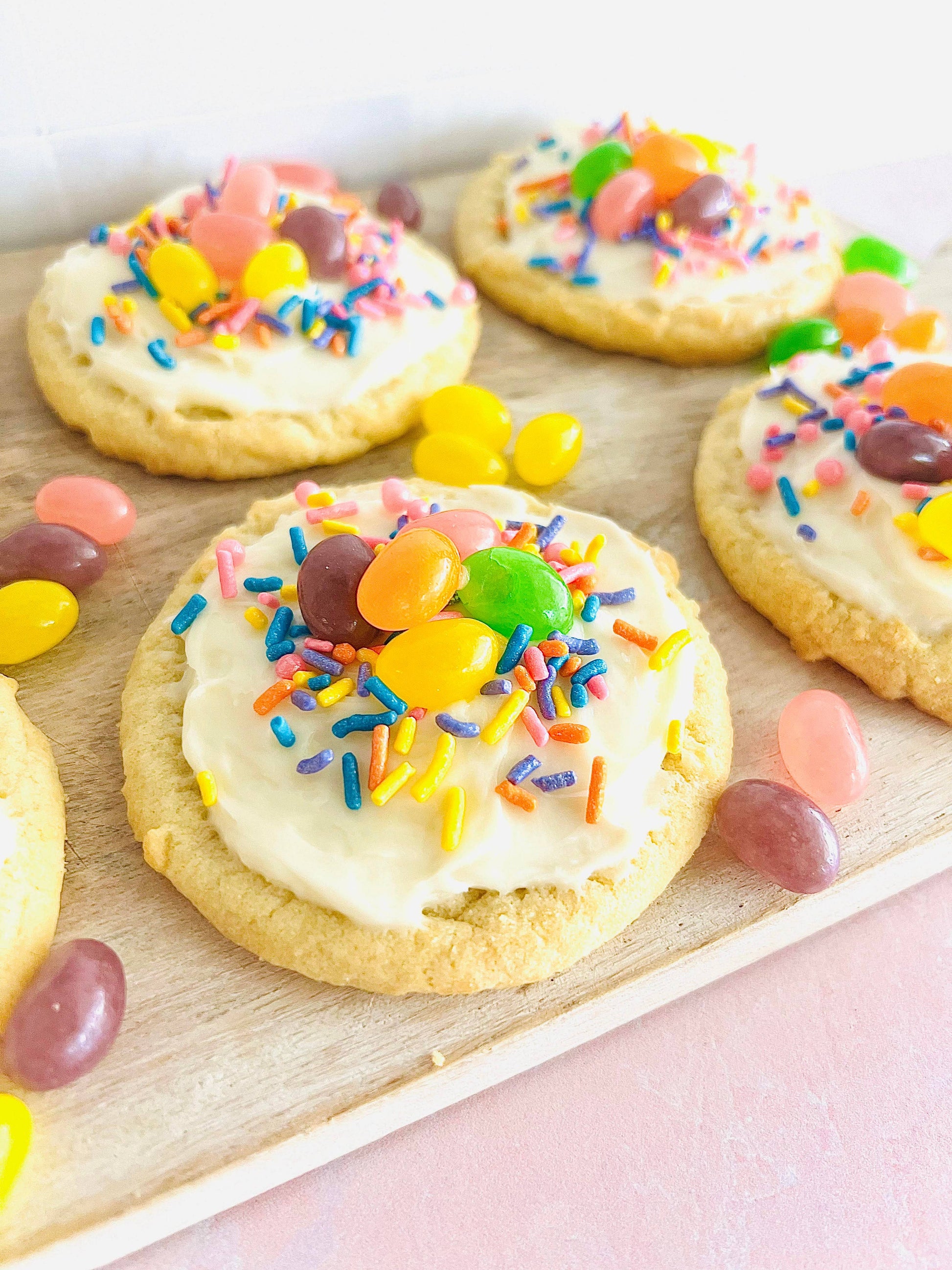 Sugar cookies with white frosting, colorful sprinkles, and jelly beans. Available in small, medium, and large sizes.