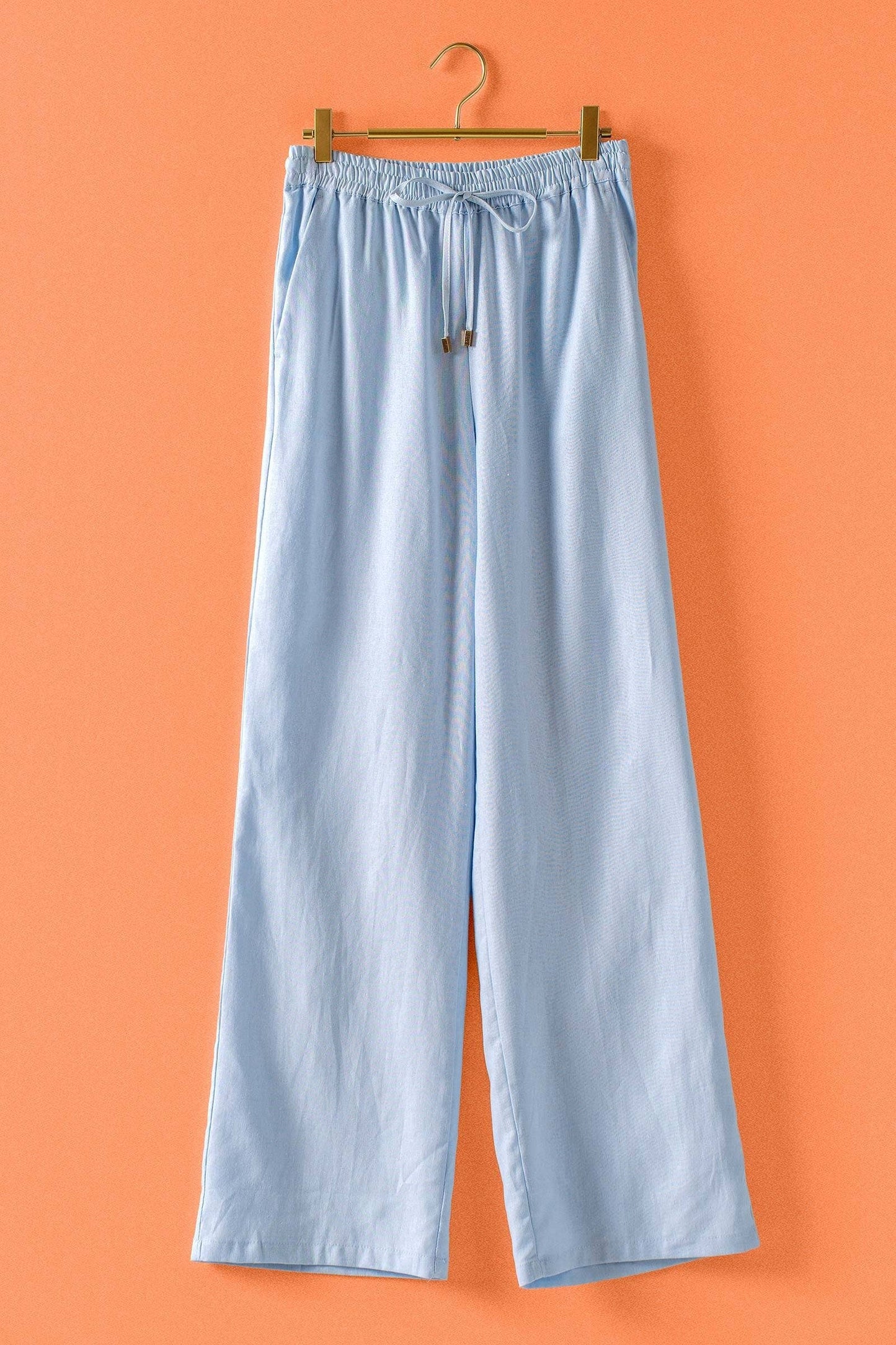 Mint Jelly Linen Blend Wide Leg Drawstring Pants in light blue with elastic waist, drawstring; available in sizes XS–XL.