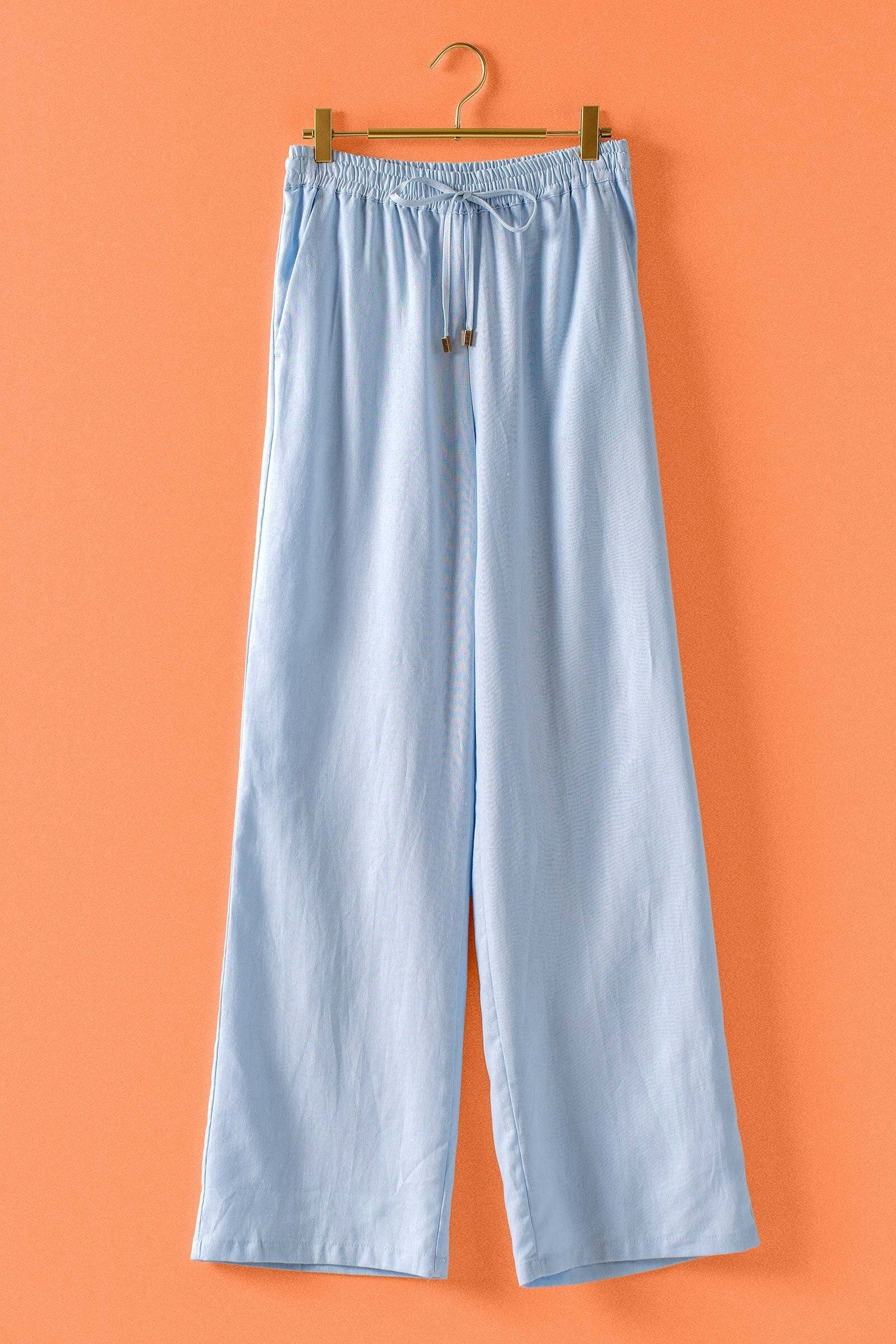 Mint Jelly Linen Blend Wide Leg Drawstring Pants in light blue with elastic waist, drawstring; available in sizes XS–XL.