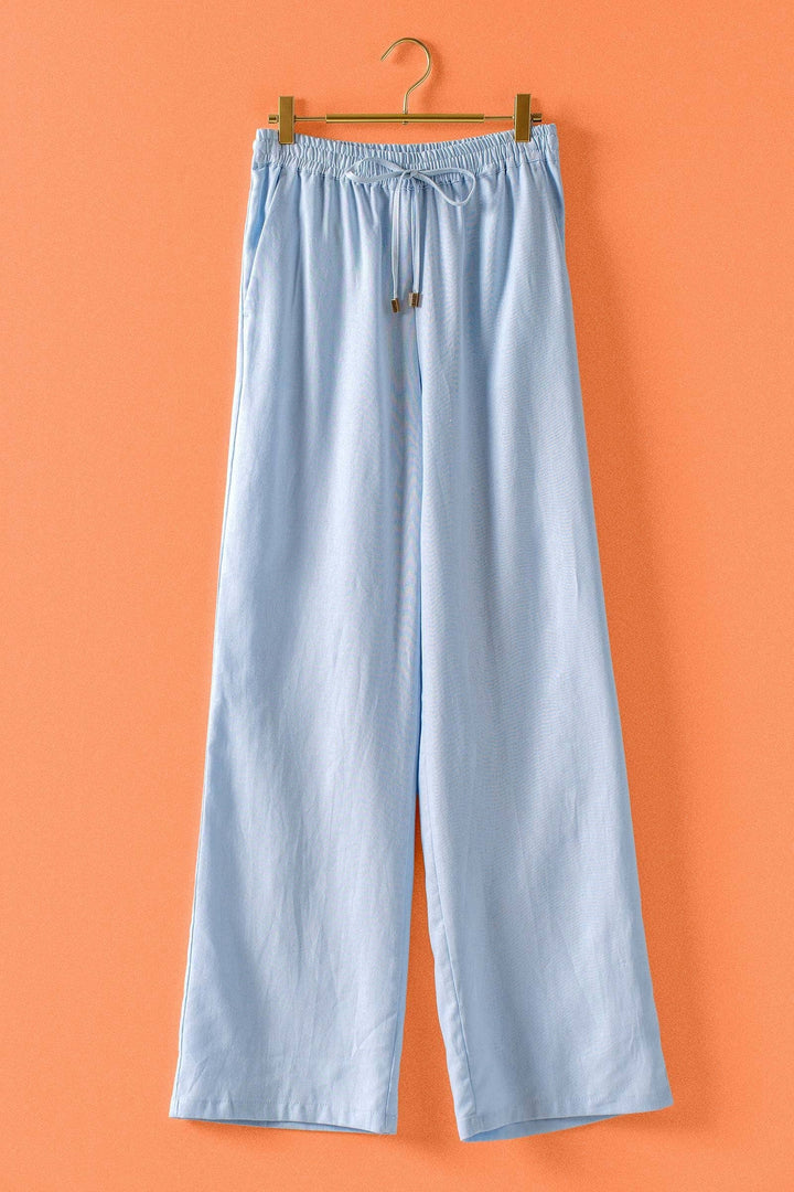Mint Jelly Linen Blend Wide Leg Drawstring Pants in light blue with elastic waist, drawstring; available in sizes XS–XL.