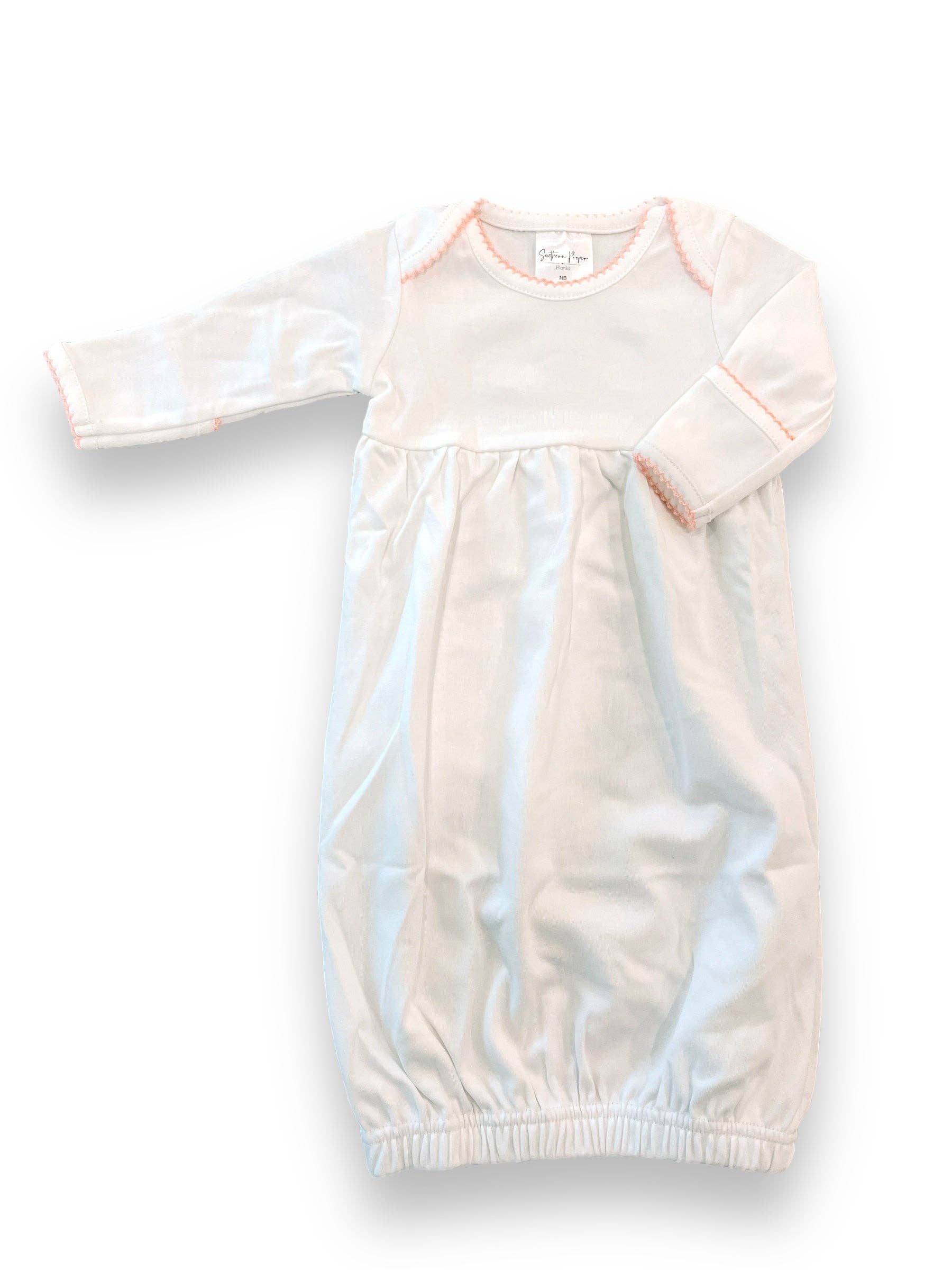 A Picot Trimmed Baby Sleeping Gown | 0-6M | White with long sleeves, pale blue satin lower half, and white upper half with pink picot trim, laid flat against a white background.