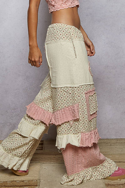Textured Twill Contrast Ruffle Printed Woven Wide Pants in cream/pink floral, ruffles/textured panels. Sizes: XS–XL.