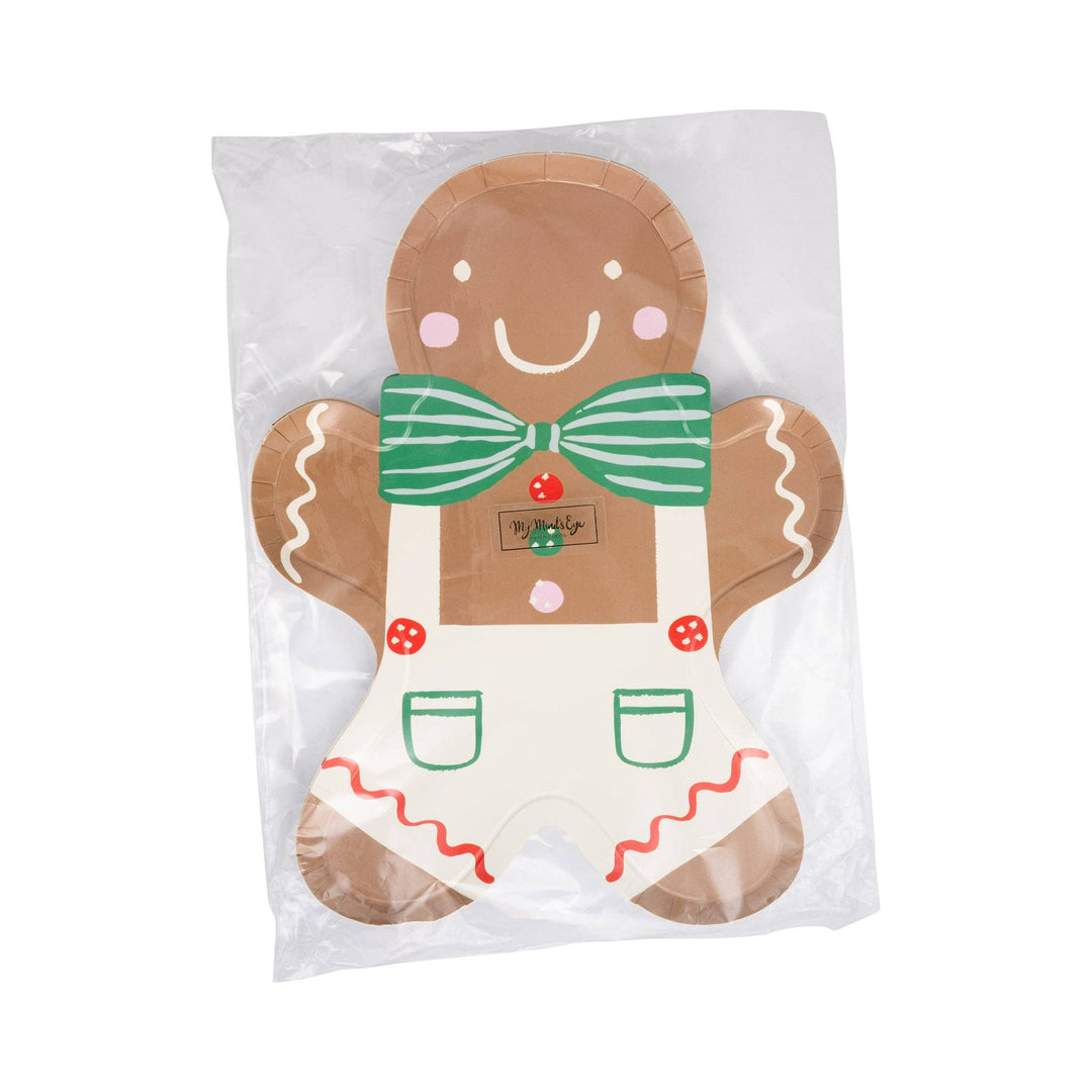 Gingerbread man plate with a green striped bow tie and white overalls.