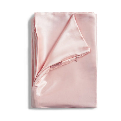 The Satin Pillowcase - Blush is a smooth, frizz-free pillowcase with a slight sheen. Available in standard and king sizes.