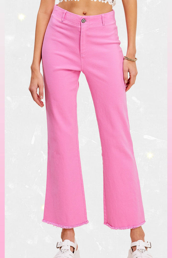 Candy Pink Soft Washed Stretchy High Waisted Flare Pants with frayed hems. Available in sizes XS-XL.