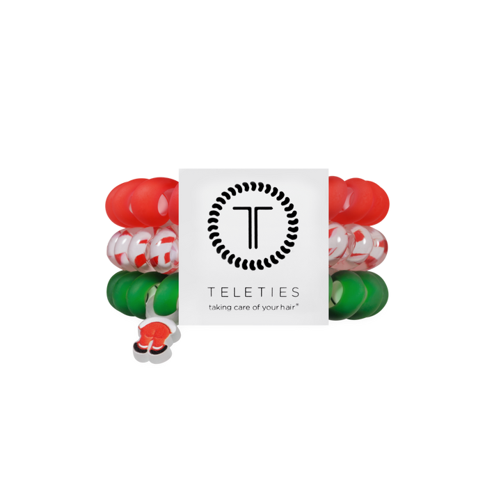 Claus I said So Large hair ties in red, peppermint stripe, and green spiral coils with Santa-inspired charms.
