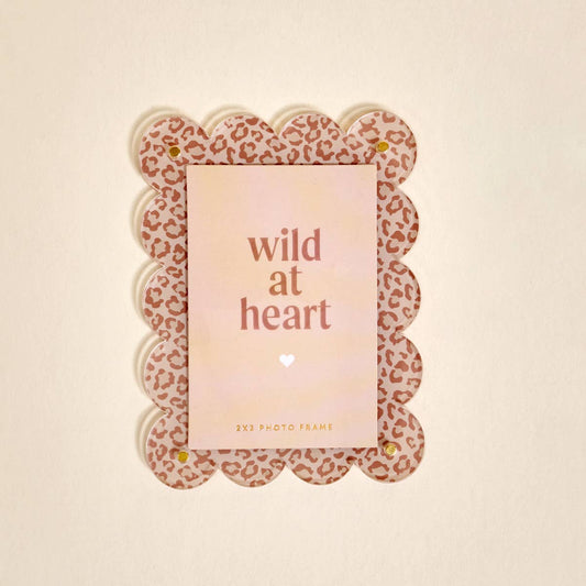 Mini acrylic picture frame magnet with scalloped edges, pink leopard border, and "wild at heart" card; available in 3x2 in.
