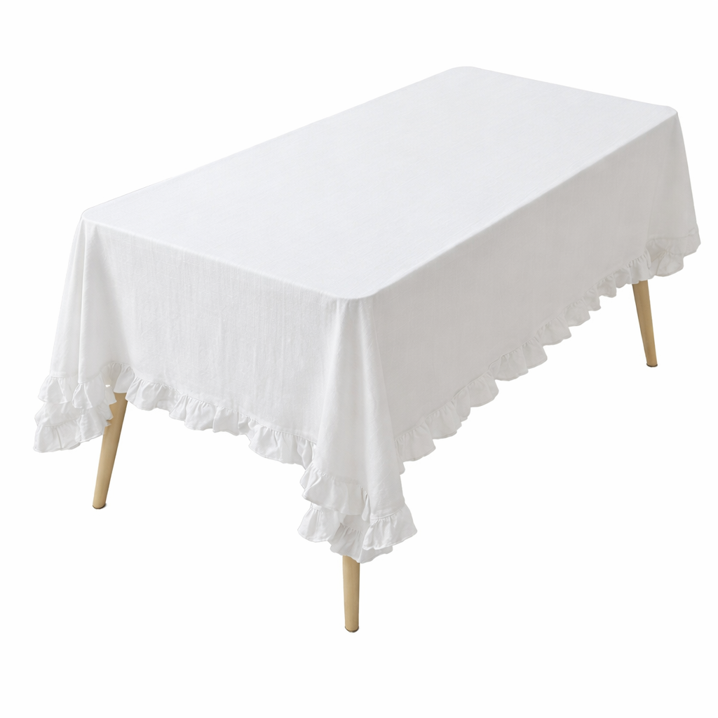 White French Ruffled Cotton Tablecloth (55″X120″) with crisp white fabric and elegant ruffled edges; available in 55″X120″.