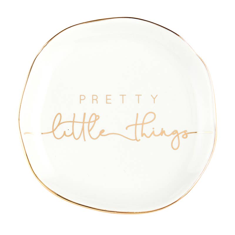 White ceramic trinket tray with uneven edges, gold trim, "Pretty little things" text. Sizes available: small, medium.