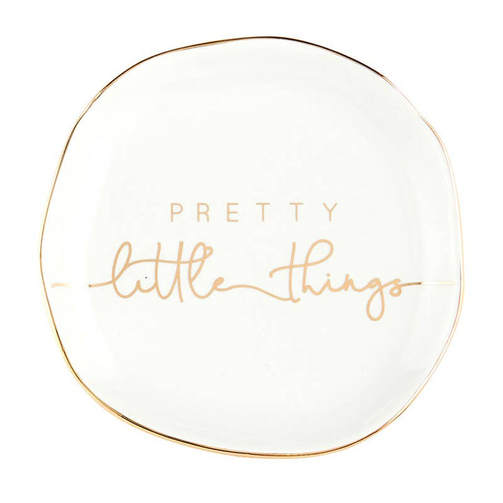 White ceramic trinket tray with uneven edges, gold trim, "Pretty little things" text. Sizes available: small, medium.