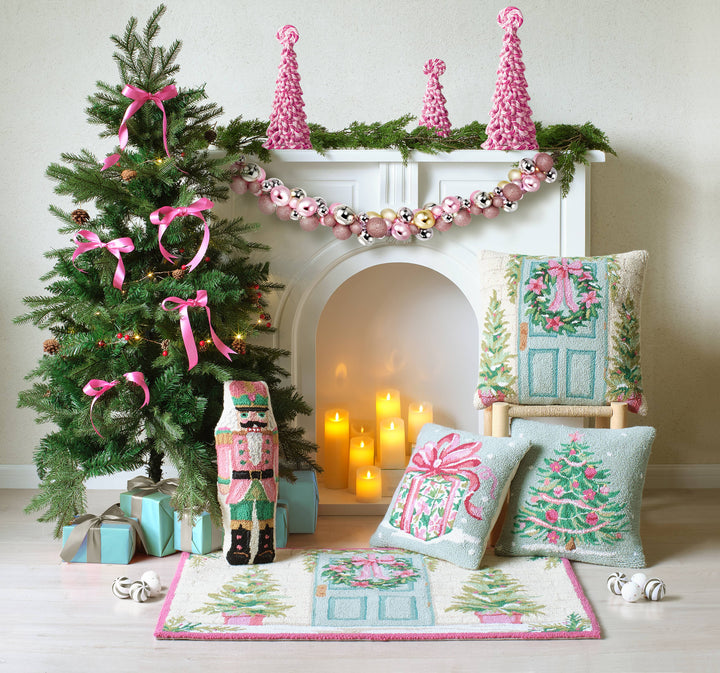 Shaped Pink Nutcracker Hook Pillow in pastel pink; available sizes: 16″x8″.