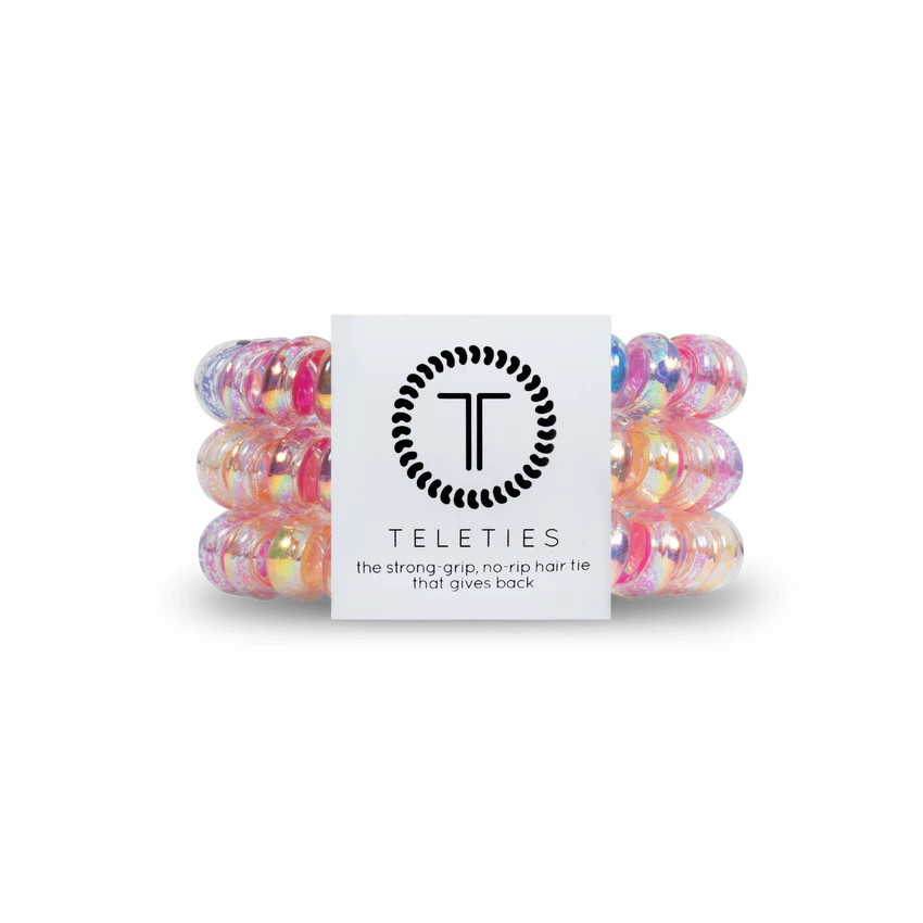 Vibrant TELETIES Hair Ties in pink, orange, blue, and clear. Available in sizes: Small and Large.