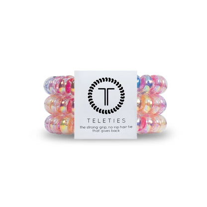Vibrant TELETIES Hair Ties in pink, orange, blue, and clear. Available in sizes: Small and Large.