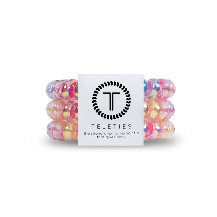 Vibrant TELETIES Hair Ties in pink, orange, blue, and clear. Available in sizes: Small and Large.