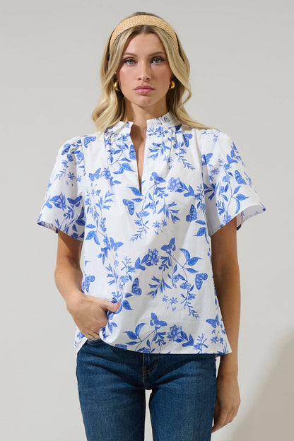 Leya Floral Inaya Split Neck Top in blue and white floral print. Available in sizes XS-XL.