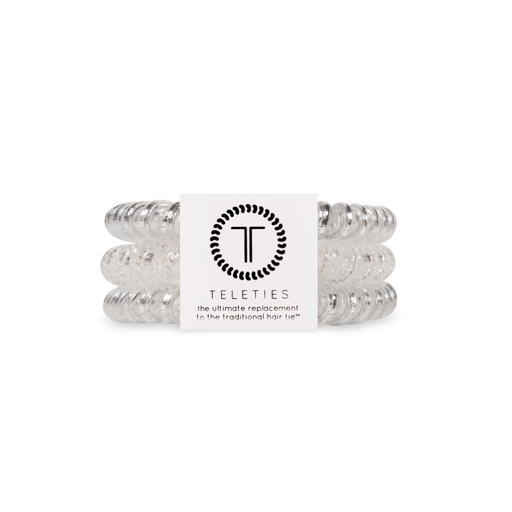 Pack of three clear spiral hair coils with silver accents for all-day hold. Available in small, medium, and large sizes.