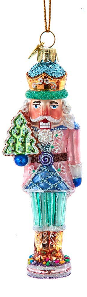 5″ handpainted nutcracker holding a Christmas tree.