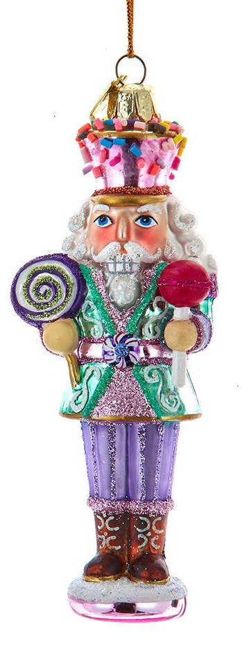 5″ handpainted nutcracker wearing a sprinkle-topped hat.