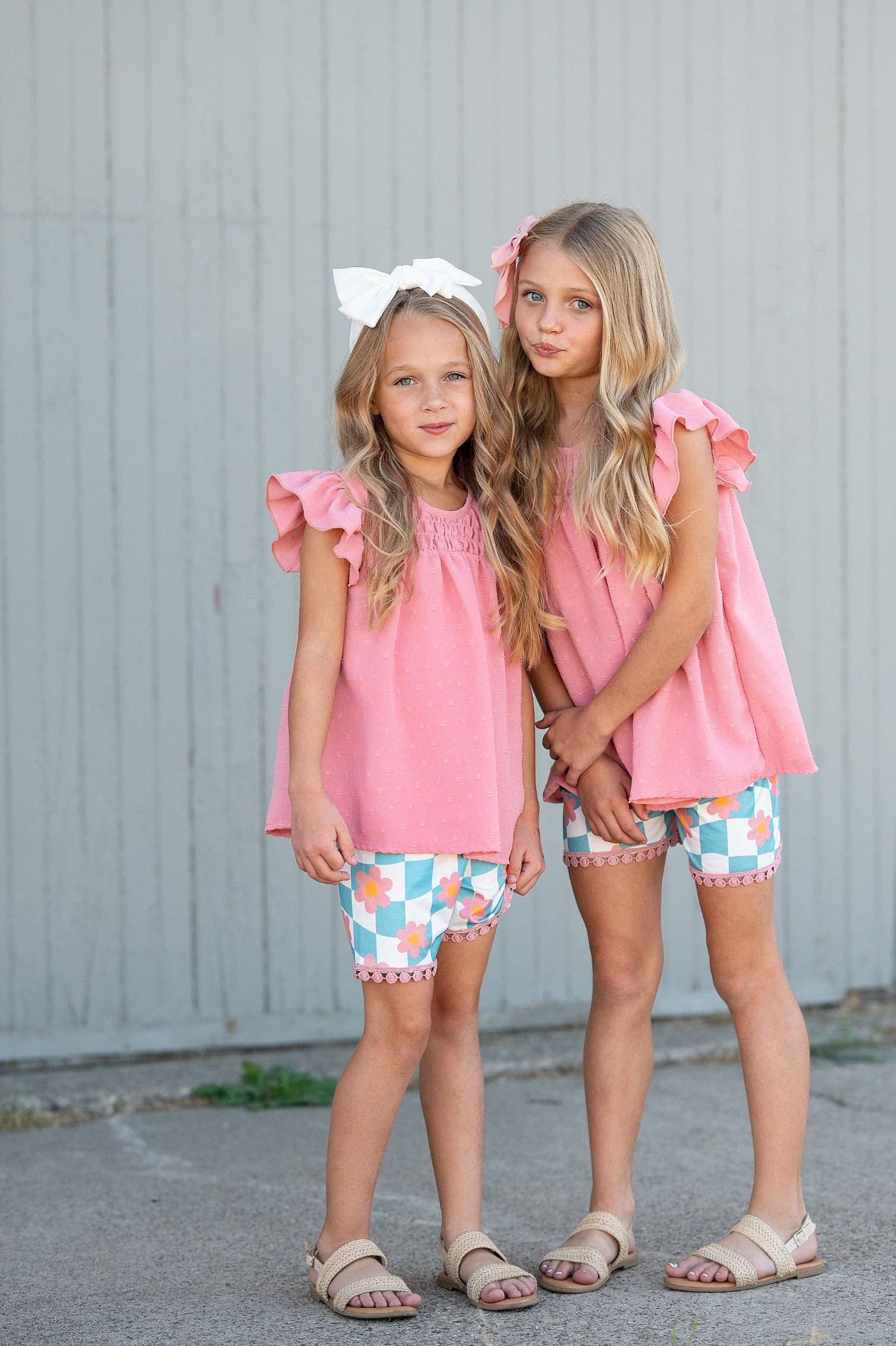 Girls Teal Check Wave Short Set; available in sizes 2T-10; features teal check pattern and wave detail.