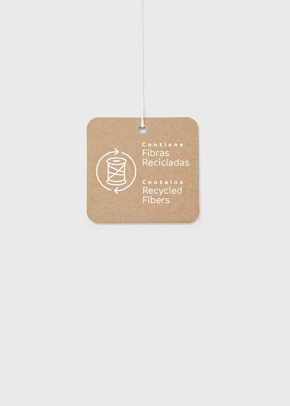Brown square tag with white text, “Contiene Fibras Recicladas” and “Contains Recycled Fibers,” plus a spool-and-arrows icon; for Baby Girl Floral Printed Velvet Dress, available in sizes 0-3M to 18-24M.
