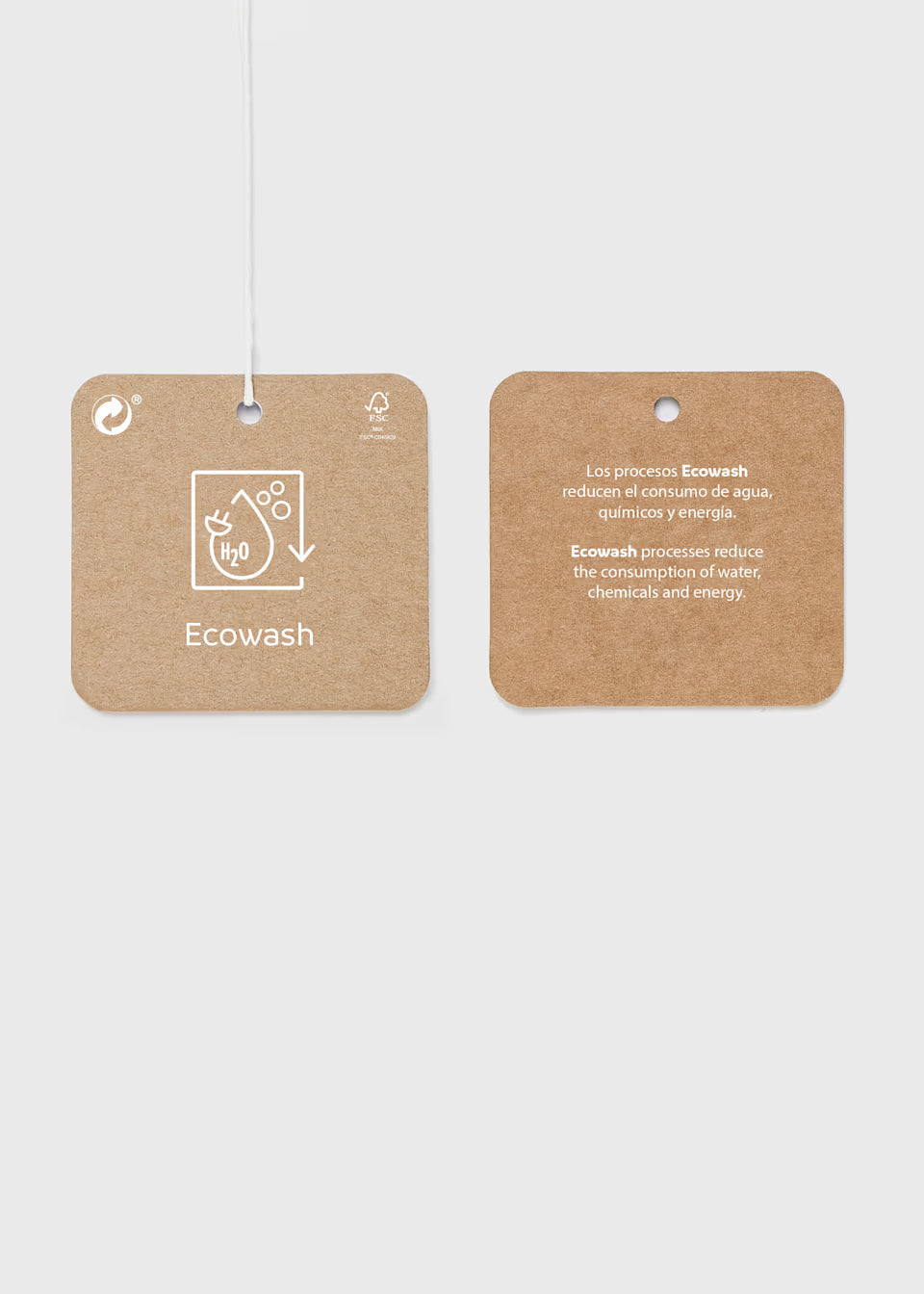 Little Girl Denim Skinny Fit Jeans with two attached brown square tags showing “Ecowash” details and eco-friendly icons. Available sizes: 4-14.