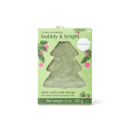 Tree-shaped, soap-infused sponge with pine branch packaging, winterberry scent, and shea butter; 3 oz. size.