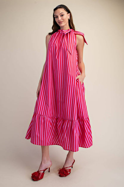 Navy Stripe Midi Dress with sleeveless ruffle neck tie. Available in sizes XS-XL.