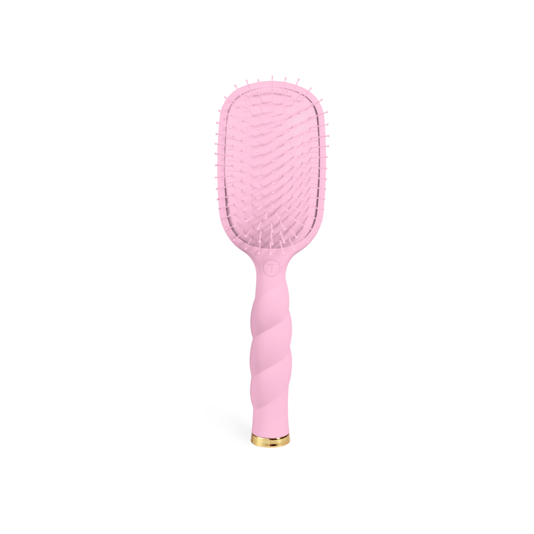 Bubblegum pink Detangler Brush, Medium, featuring a twisted handle and gold-tone base.