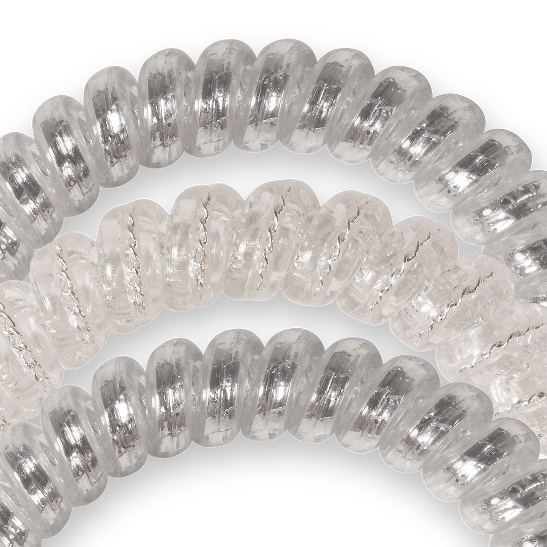 Three transparent spiral hair ties with silver glitter threads. Available in small, medium, and large sizes.