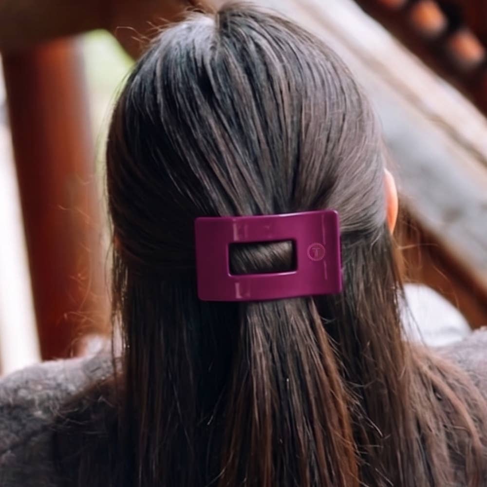 Mulberry Small Flat Rectangle Hair Clip shown in use; available in small size.