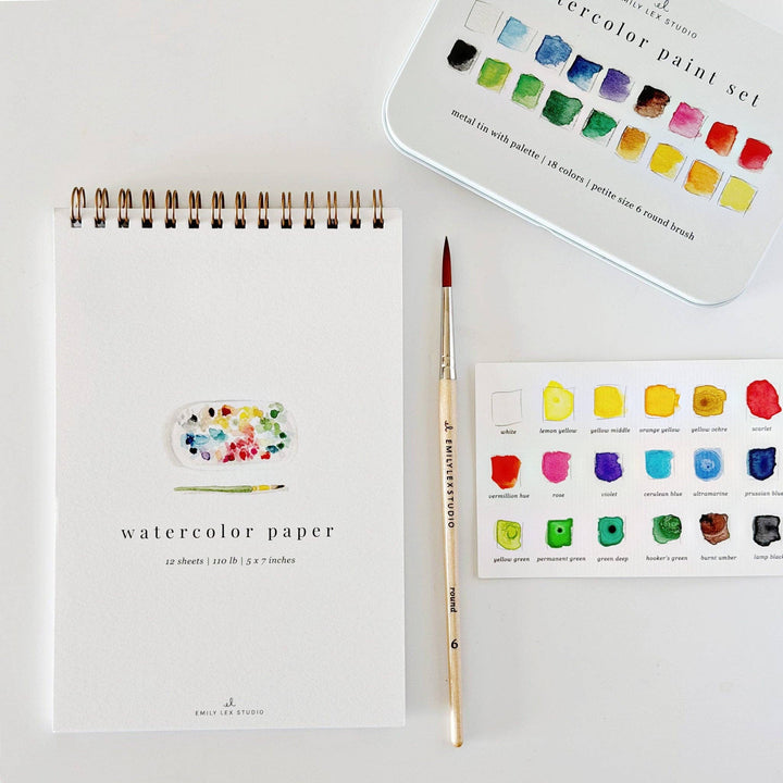 Spiral watercolor paper pad with 12 sheets of 110 lb cold press paper, 5 by 7 inches.