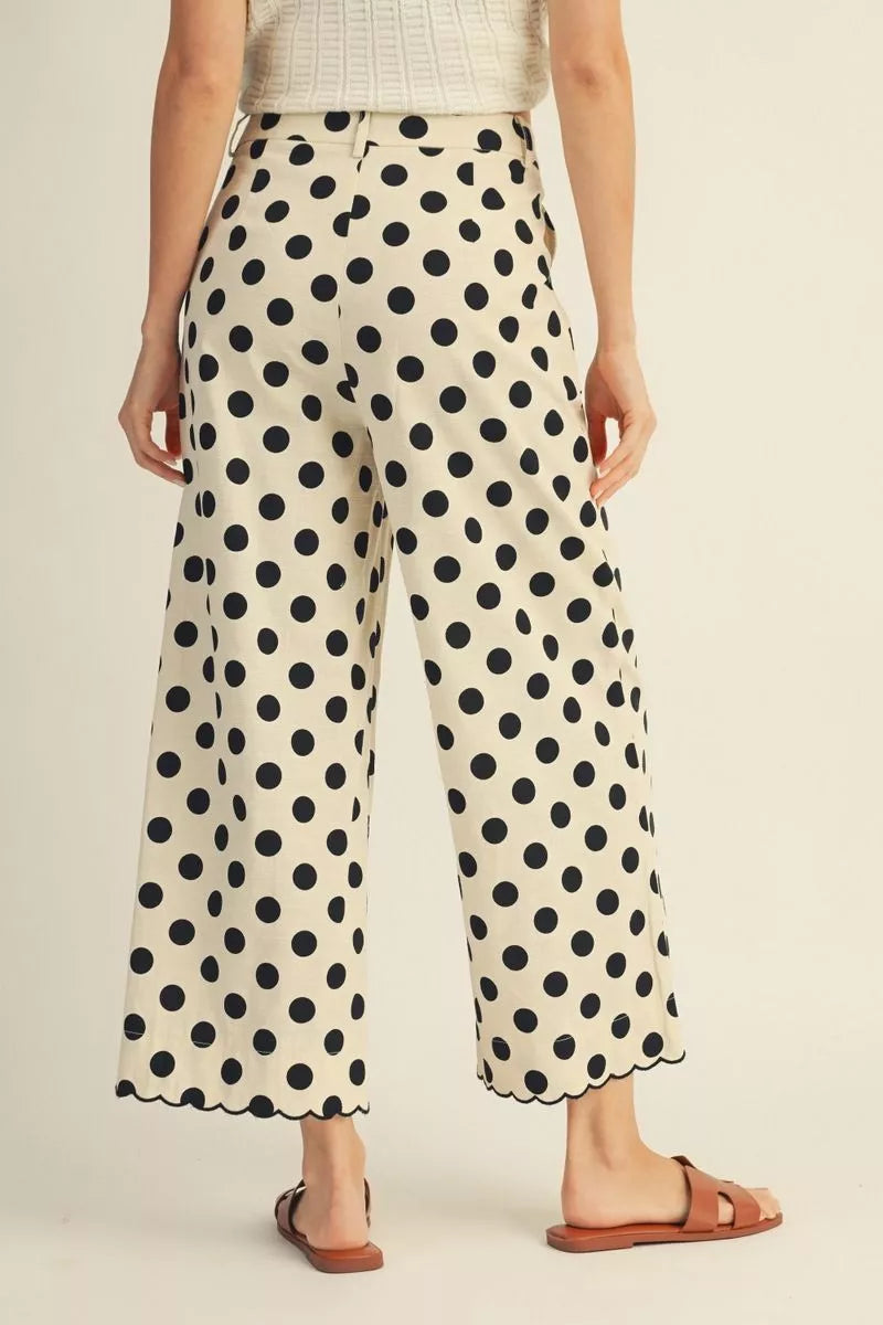 Black HW Wide Scallop Detail Polka Dot Pants; available in sizes XS-XL.