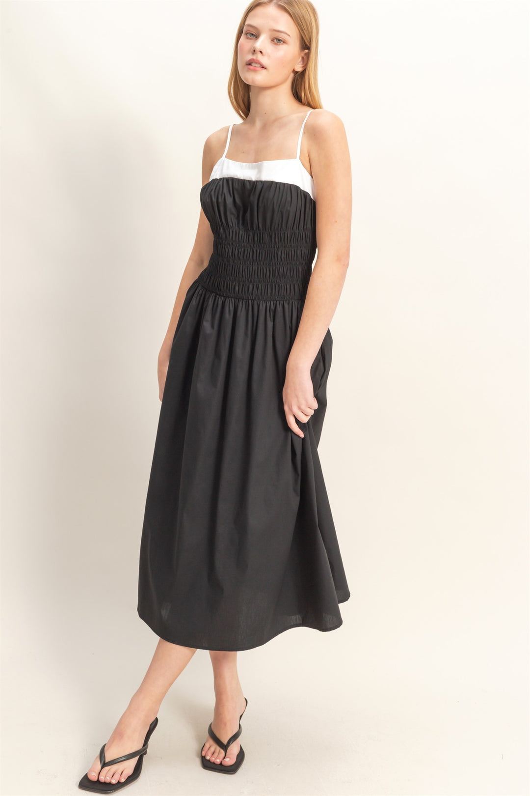 Smocked Strapped Midi Dress in 2 colors with white smocked bodice, black skirt, spaghetti straps. Available in XS-XL.