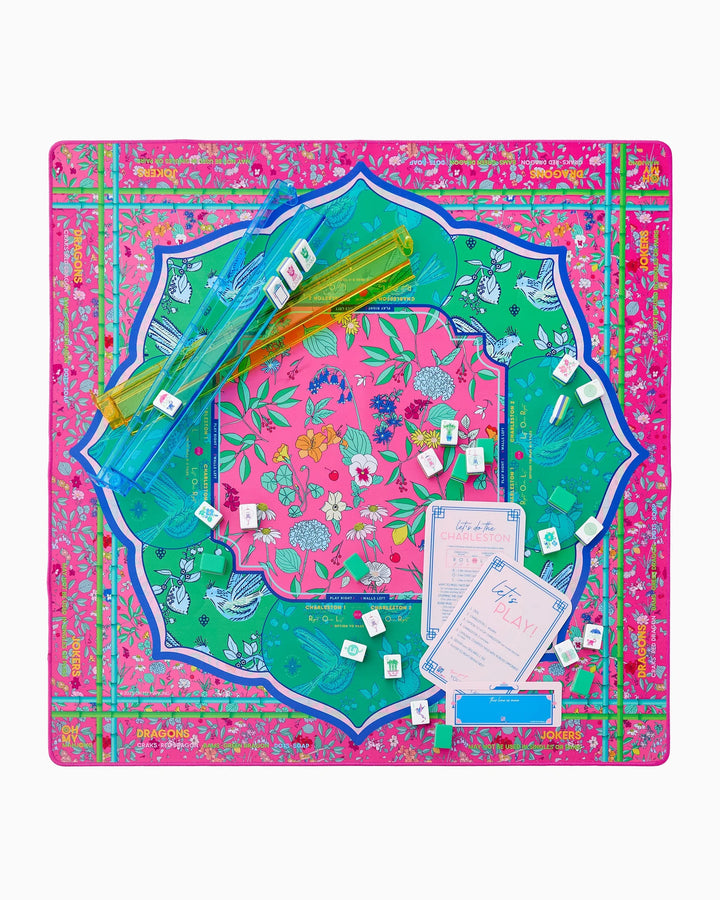 The Enchanted Mat: vibrant pink, green, and blue Mahjong mat. Available sizes: standard and large.
