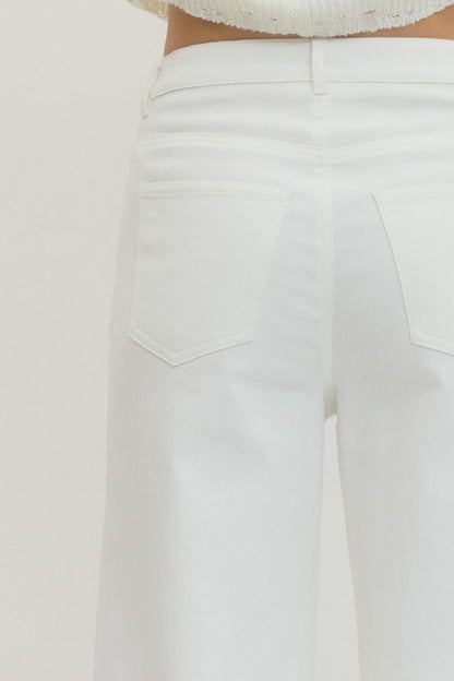 Off-White MR Ankle Length Pants with waistband and back pockets. Available in sizes XS–XL.