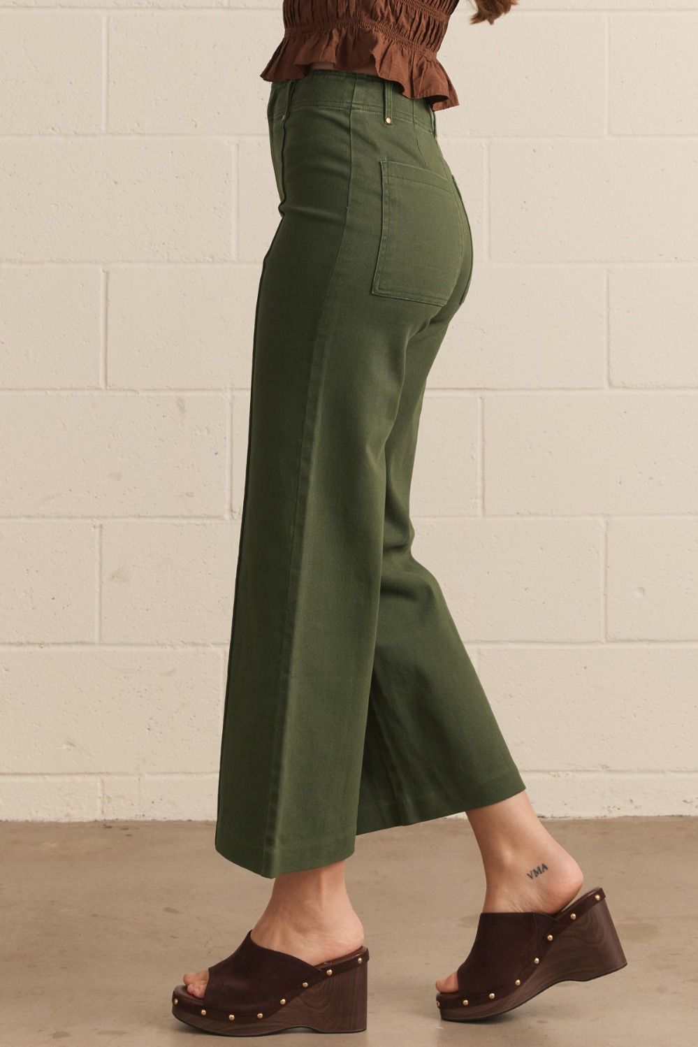Evergreen High Rise Wide Leg Pants in olive green. Available in sizes XS-XL.