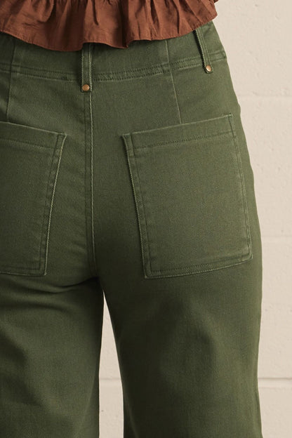 Evergreen High Rise Wide Leg Pants in hunter green with large back pockets; available in sizes XS-XL.